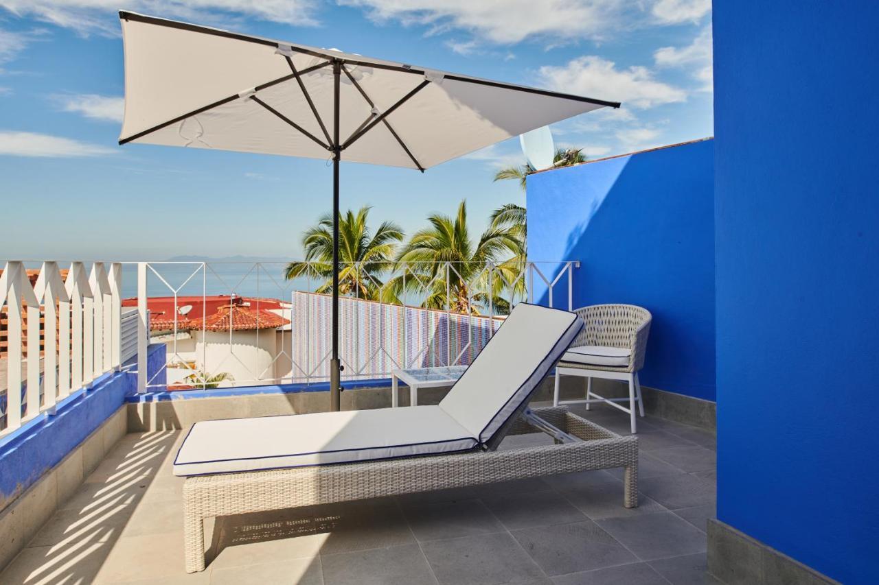 Hotel Luxury Patio Azul (Adults Only) 푸에르토 발라타 외부 사진 A cantilever umbrella