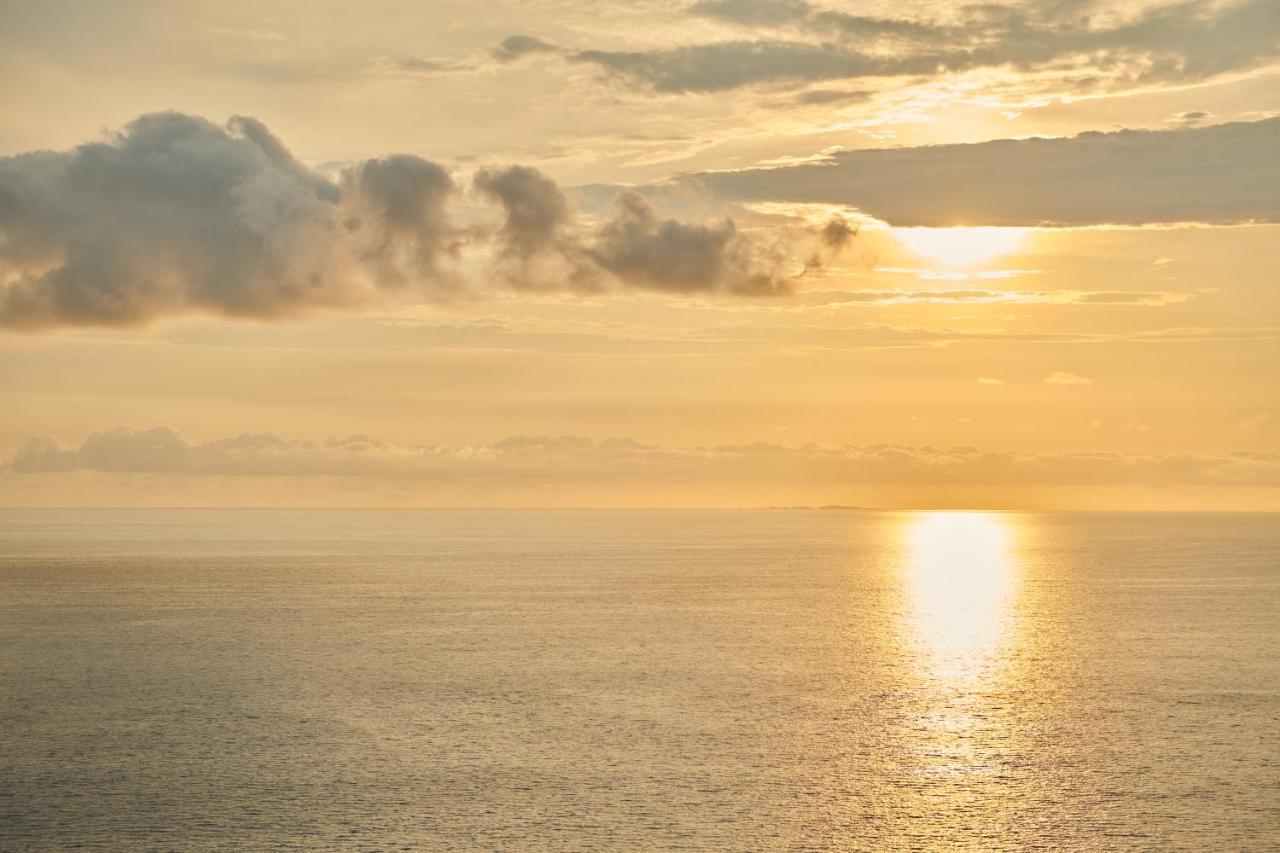 Hotel Luxury Patio Azul (Adults Only) 푸에르토 발라타 외부 사진 Sunset over the Atlantic Ocean